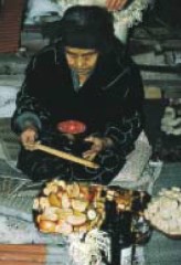 Woman praying for her ancestors