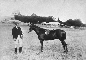 Edwin Dun and an imported horse at Makomanai Farm