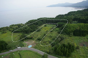 Full view of an earthwork mound at the Kakinoshima Site