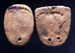 Clay tablets with footprints excavated at the Kakinoshima Site in Hakodate