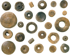 Clay earrings excavated at the Moheji Site in Hokuto